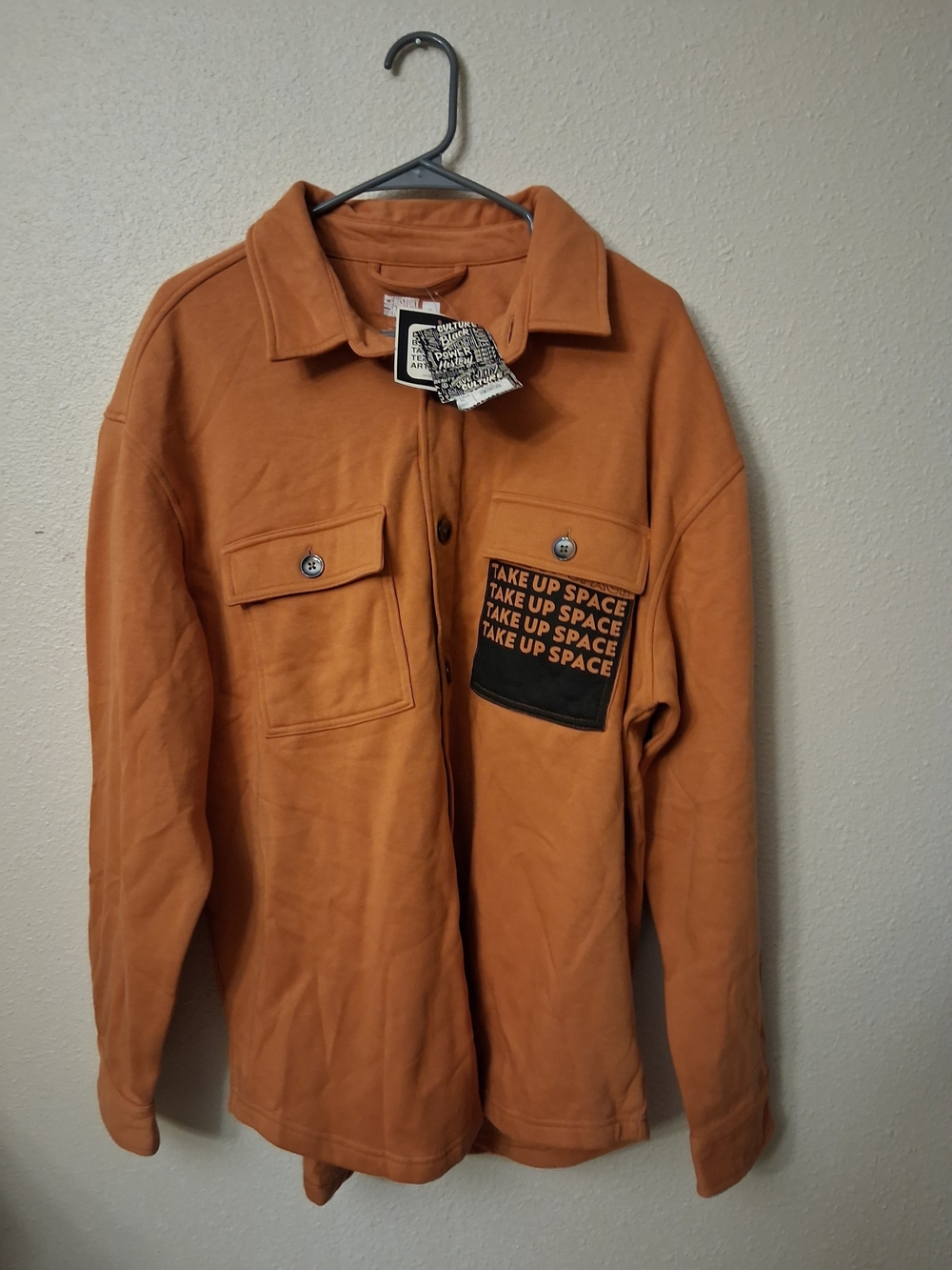 Lightweight Orange Shirt Jacket with 'Take Up Space' Pocket